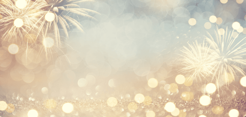 A dreamy background with soft bokeh and bursts of fireworks. A dreamy background with soft bokeh and bursts of fireworks.